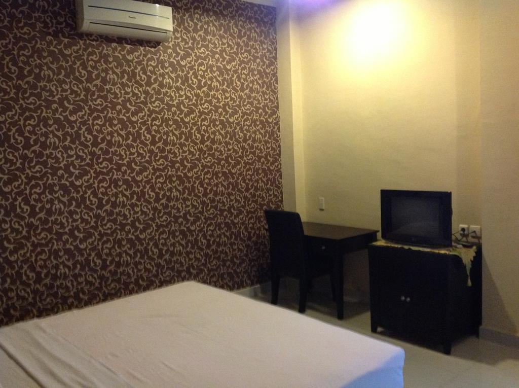 Carolina Transit Hotell Medan Rom bilde